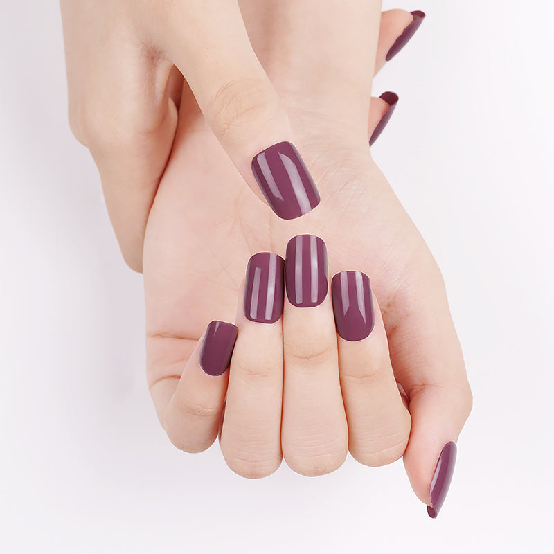 Soft mauve nails on natural hands, created with a DIY semi-cured gel sticker kit for an elegant and versatile everyday manicure.
